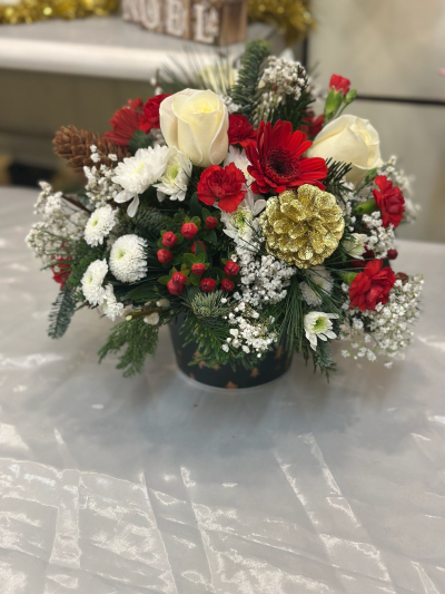 Festive Pot - Arrangement of festive flowers in a pot.
