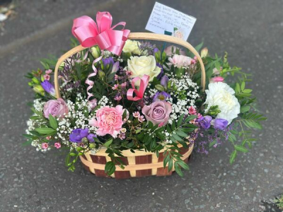 Sending Love - A sweet and elegant basket arrangement filled with soft pastel tones of blush pink, gentle lavender, creamy white, and fresh greenery. Designed with a natural, garden-inspired style, it features delicate textures and a light, airy feel. The woven basket and decorative ribbon add a charming finishing touch, while a space for a personal message makes it perfect for thoughtful gifting, celebrations, or sending a heartfelt surprise.